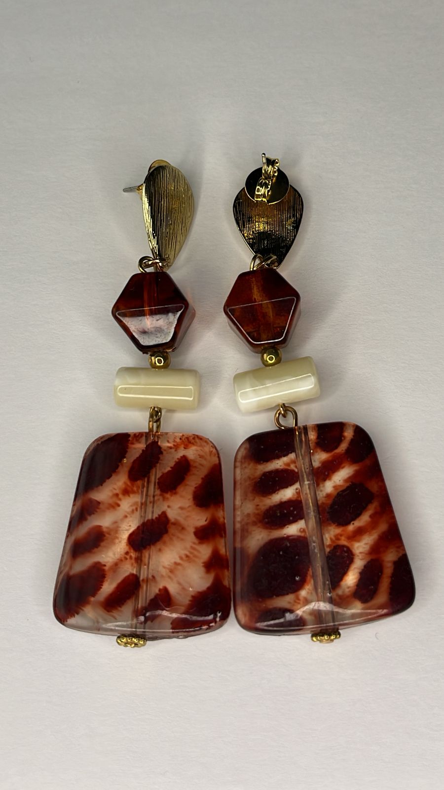 Brinco Terra Selvagem Dourado